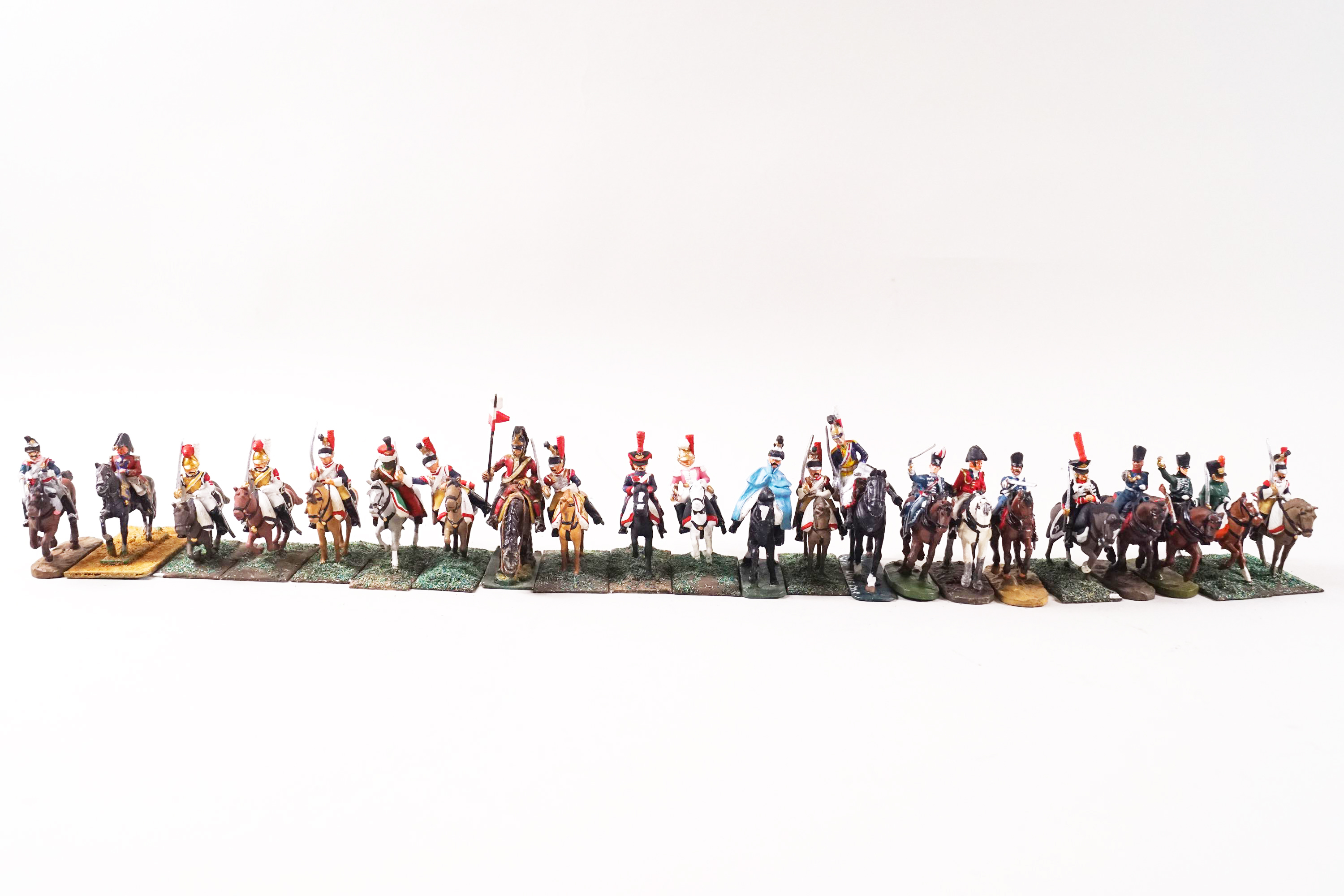 A large quantity of miniature lead soldiers on horseback with detachable riders