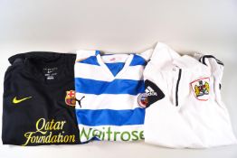 Seven replica football shirts