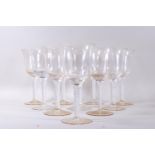 A set of drinking glasses with air twist stems,