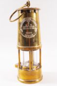 An Eccles brass miner's lamp, type 6, approval No 8/28,