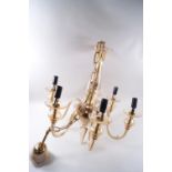A cut glass tinted six branch hanging chandelier,