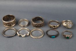 A selection of ten silver rings consisting of filigree bands and gem set. Stamped 925 for sterling.