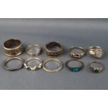 A selection of ten silver rings consisting of filigree bands and gem set. Stamped 925 for sterling.