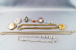 A small quantity of Victorian and later costume jewellery to include brooches,