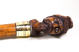 A walking stick, the knop carved with an American Civil War soldier's head,