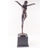 An Art Deco style bronze figure of a dancer on black slate base,