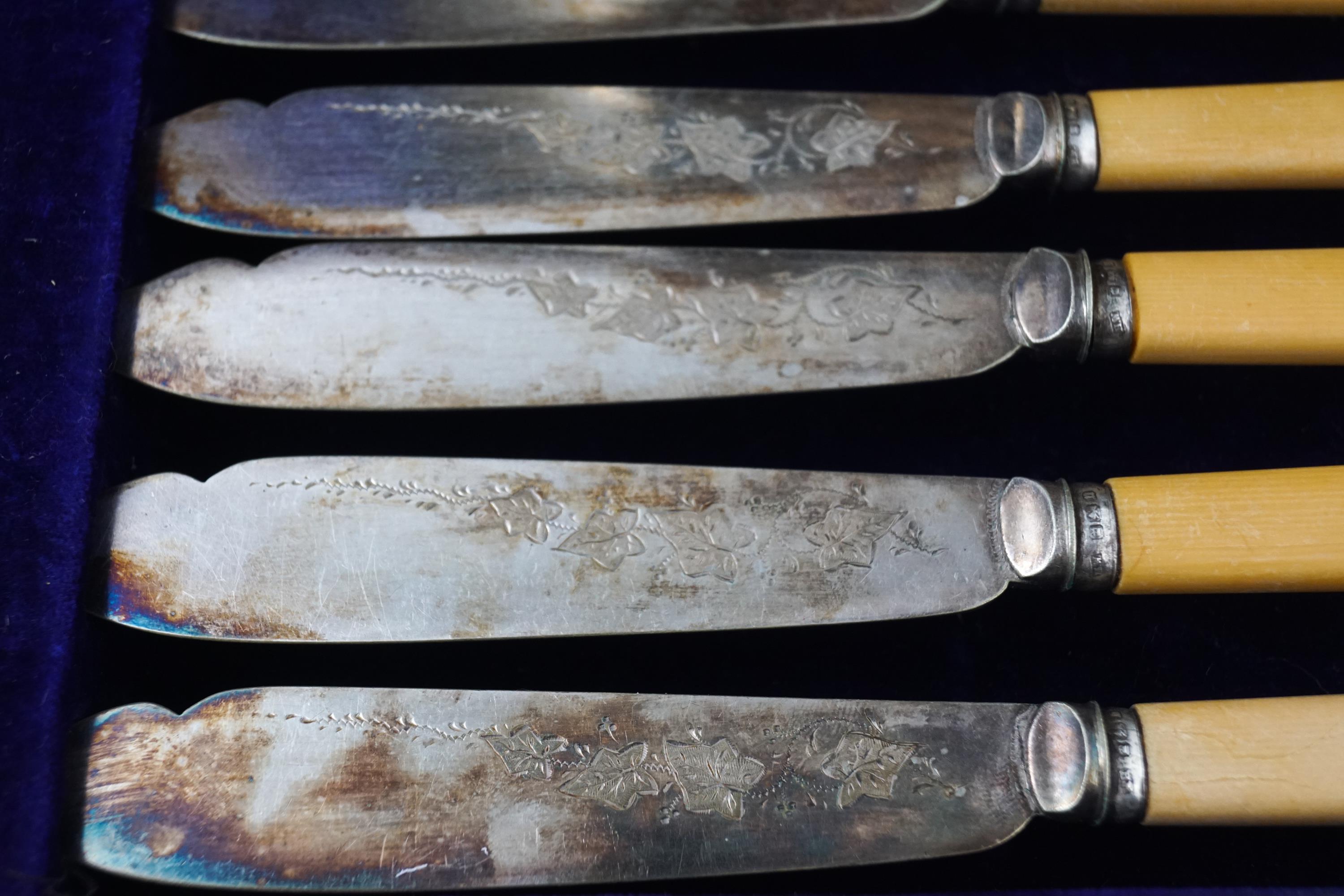 A mahogany cased set of electroplated fish knives and forks with bone handles and silver collars, - Image 2 of 2