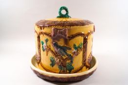 A 19th century Minton style cheese dome with bulrush decoration,