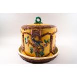 A 19th century Minton style cheese dome with bulrush decoration,