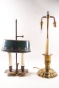 A brass candlestick converted to a table lamp as three lamps