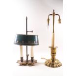 A brass candlestick converted to a table lamp as three lamps