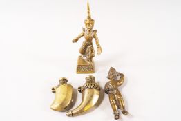 A Burmese brass figure, 12cm high,