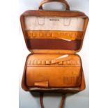 A Post Office Engineers leather case with leather handles 29cm x 44cm, circa 1974,