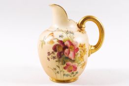 A Royal Worcester blush ivory jug, painted with flowers picked out in gilt,