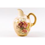 A Royal Worcester blush ivory jug, painted with flowers picked out in gilt,