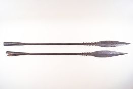 Two steel spears with barbs,