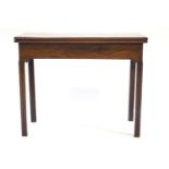 A George III mahogany rectangular card table with fine carved, fluted and beaded legs,