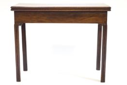 A George III mahogany rectangular card table with fine carved, fluted and beaded legs,