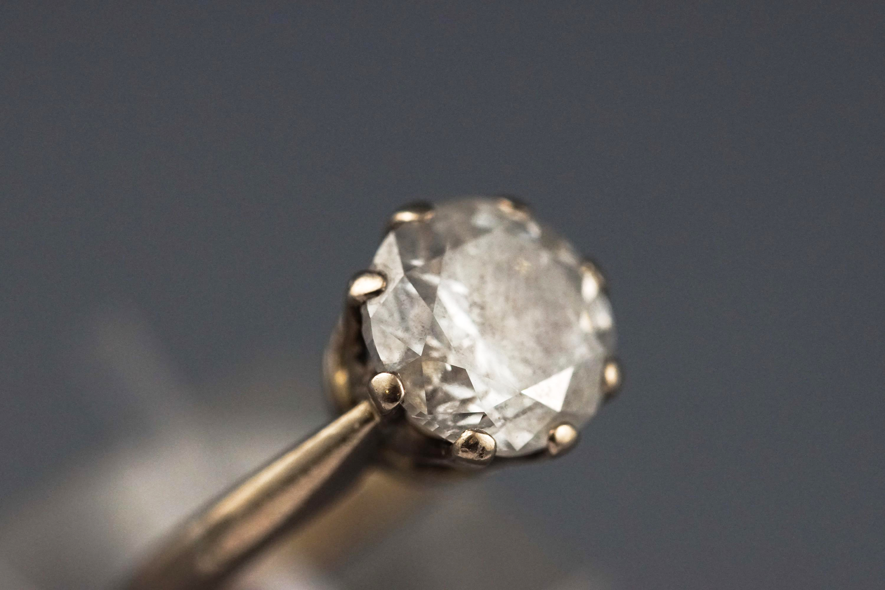 A white metal single stone diamond ring. - Image 5 of 13