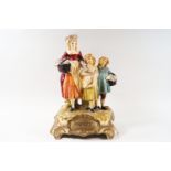 A papier mache Yardley advertising shop display in the form of three figure on a rococo style base,