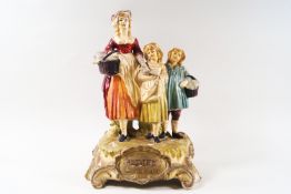 A papier mache Yardley advertising shop display in the form of three figure on a rococo style base,