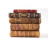 A collection of leather bound books including "Les Saisons Poeme Traduit de Anglais De Thompson"