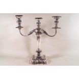 A loaded silver three branch candelabra of lobed floral decoration form, Sheffield 1963,