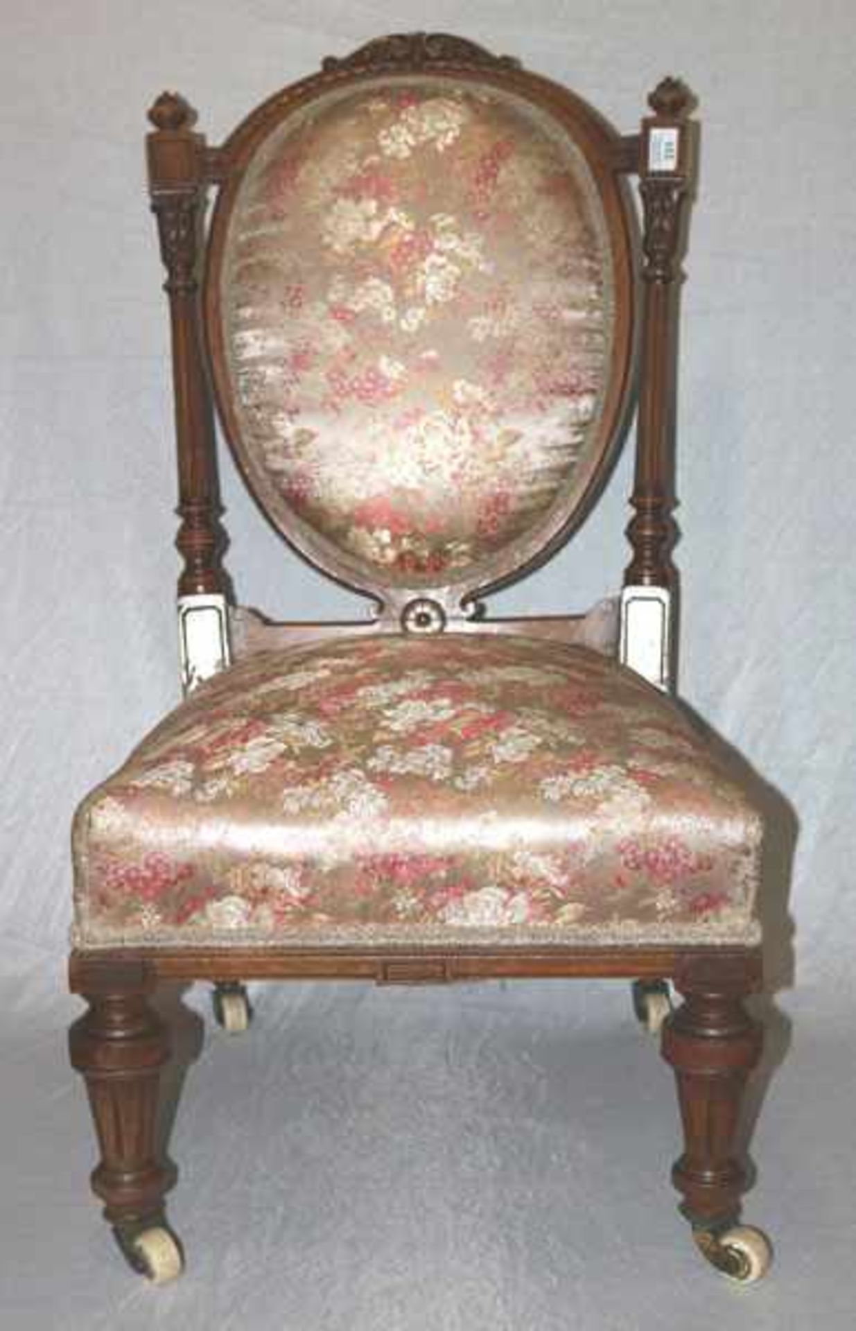 Stillstuhl, teils beschnitzt, Sitz und Lehne gepolstert und floral bezogen, H 95 cm, B 48 cm, T 50