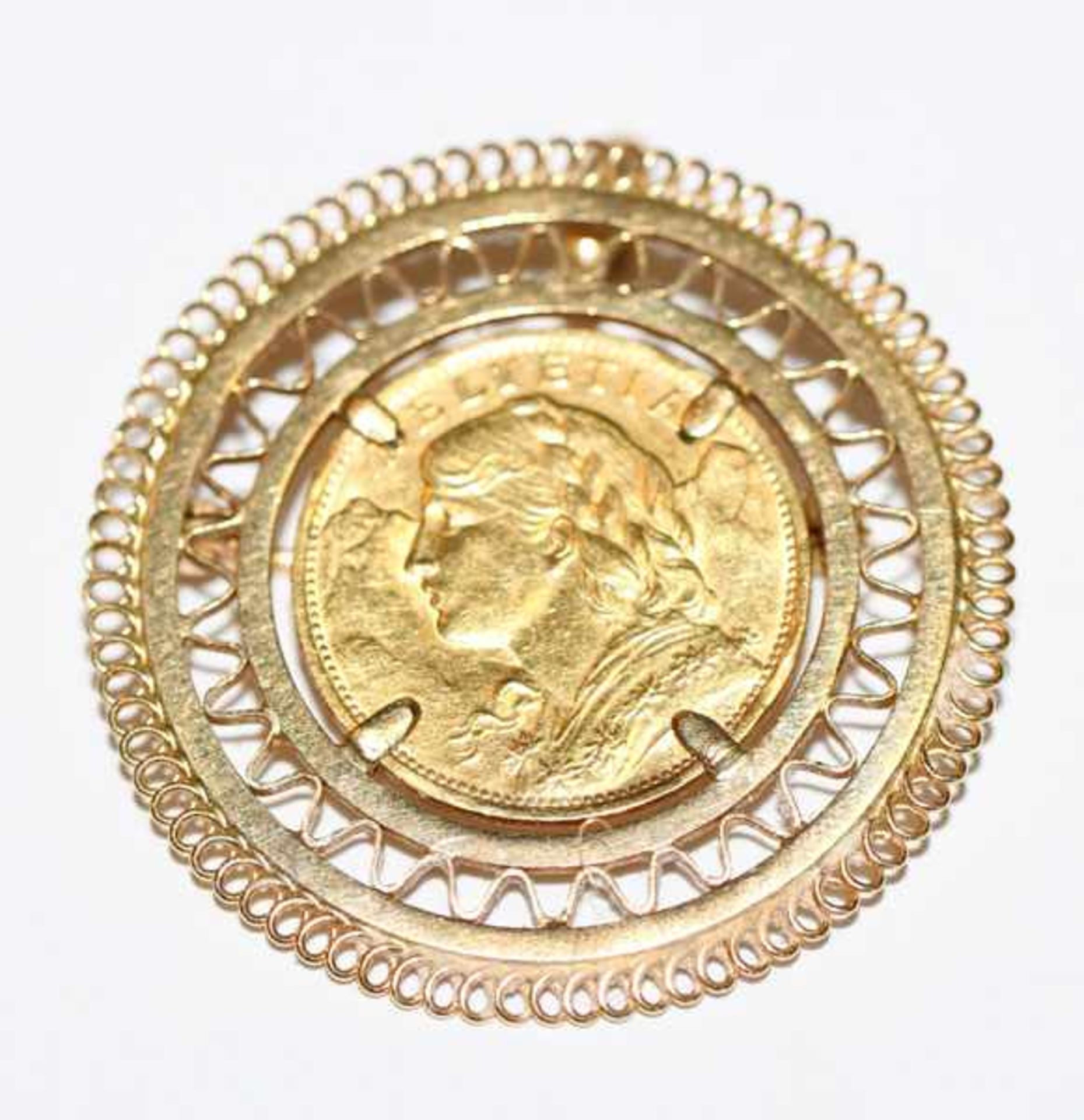 Brosche, 20 Schweizer Franken, 6,45 gr. = 5,8 gr. Feingold, 18 k Gelbgold Fassung, zus. 14 gr., D