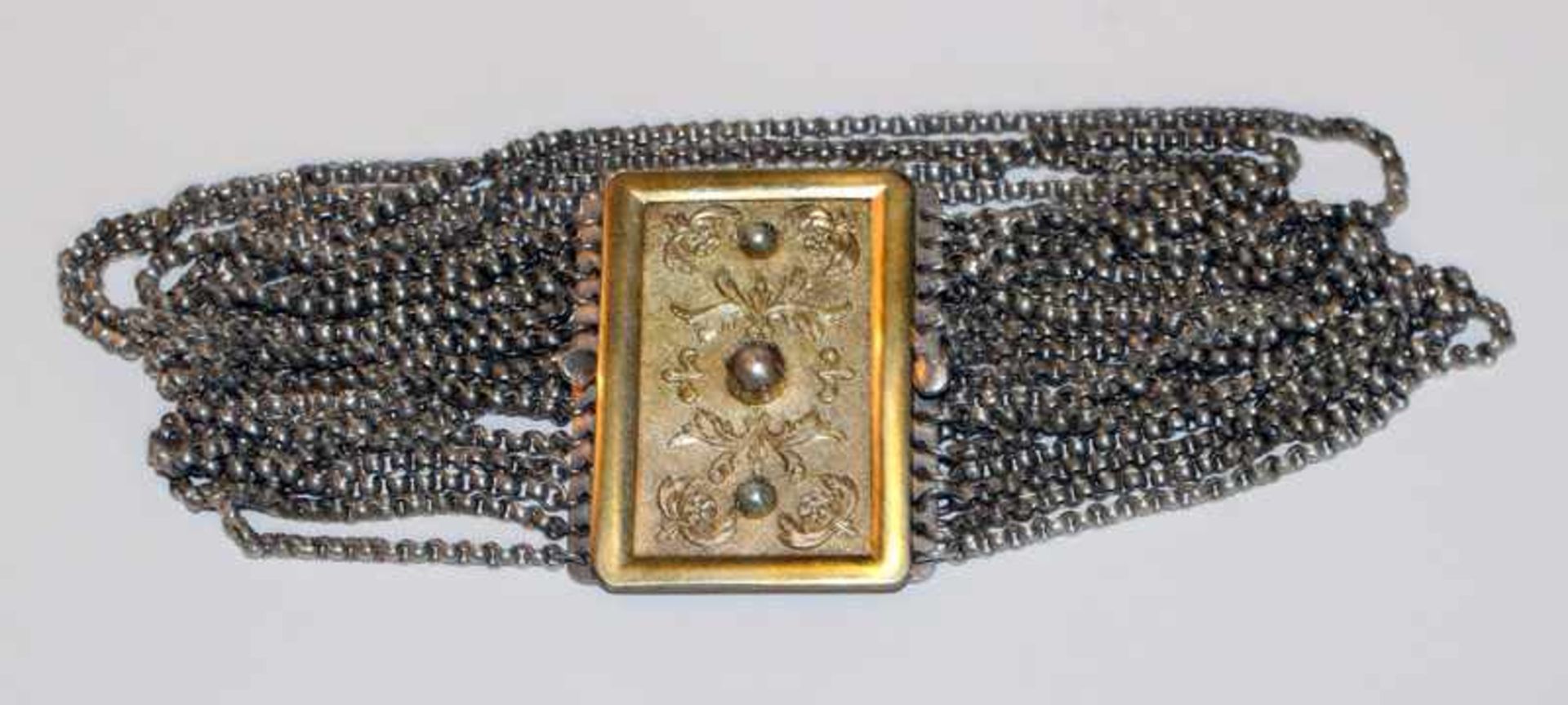 Silber Kropfkette, 12-reihig mit vergoldeter Schließe, Reliefdekor unt 3 Perlen, L 33 cm, 140 gr.