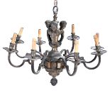 Louis XV Style Eight Light Brass Chandelier with Cherub Decoration