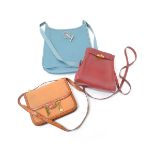 Three Hermes Bags; One Blue, One other with Trim, and Red Bag