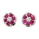 Pair of Diamond, Ruby, 18k White Gold Stud Earrings.