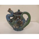 A small Brannam blue glazed teapot, 1907 – spout damaged.