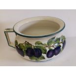 A Wemyss plum pattern painted chamber pot with green rim – yellow painted marks , T. Goode & Co.