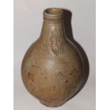A 17thC greybeard bellarmine jug, 11”