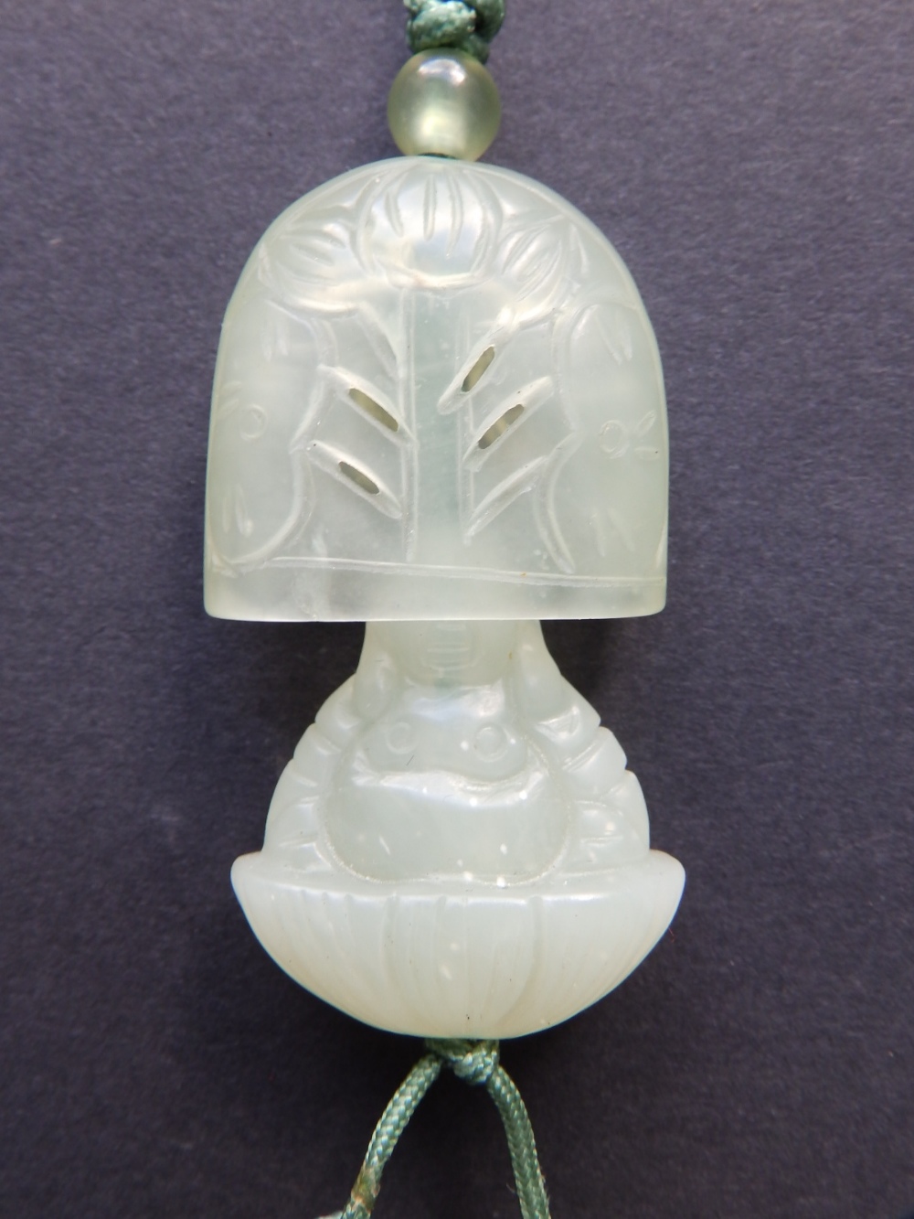 A Chinese jade concealed Buddha pendant, the flattened domed cover open carved with a flowering - Image 2 of 6