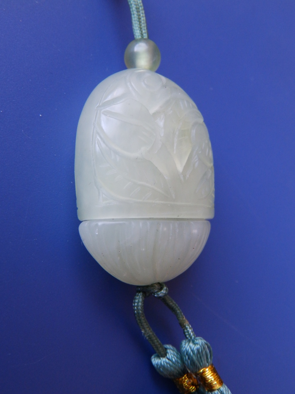 A Chinese jade concealed Buddha pendant, the flattened domed cover open carved with a flowering - Image 5 of 6