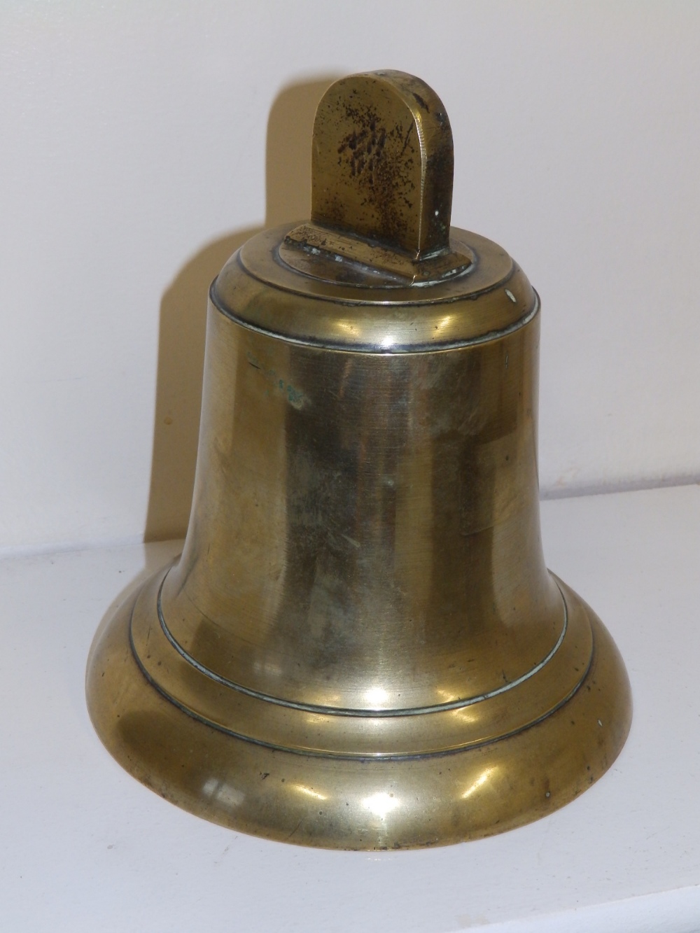 A brass bell.