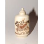 A Chinese bone snuff bottle.