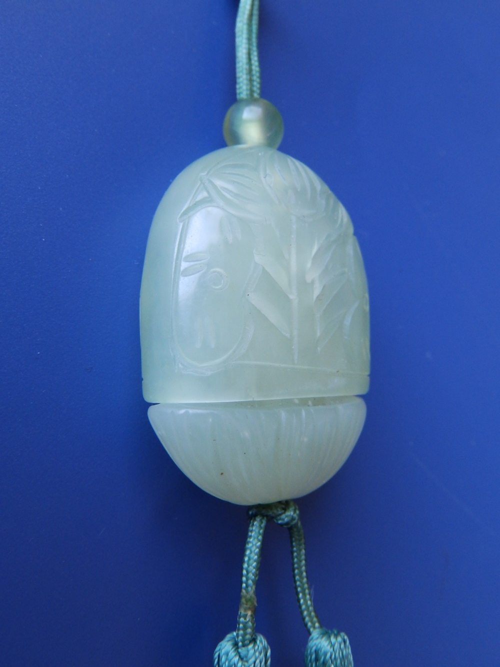 A Chinese jade concealed Buddha pendant, the flattened domed cover open carved with a flowering - Image 4 of 6