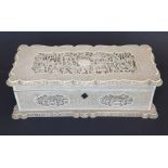 A 19thC Cantonese ivory jewellery box of rectangular form, the hinged lid (detached) displaying a