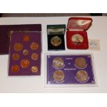 A cased 1970 GB proof coin set, four cased 'Crowns of Great Britain' – 1965-1980 and two other