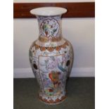 A large 20thC Chinese porcelain vase decorated with birds in panels, 32.5” high.