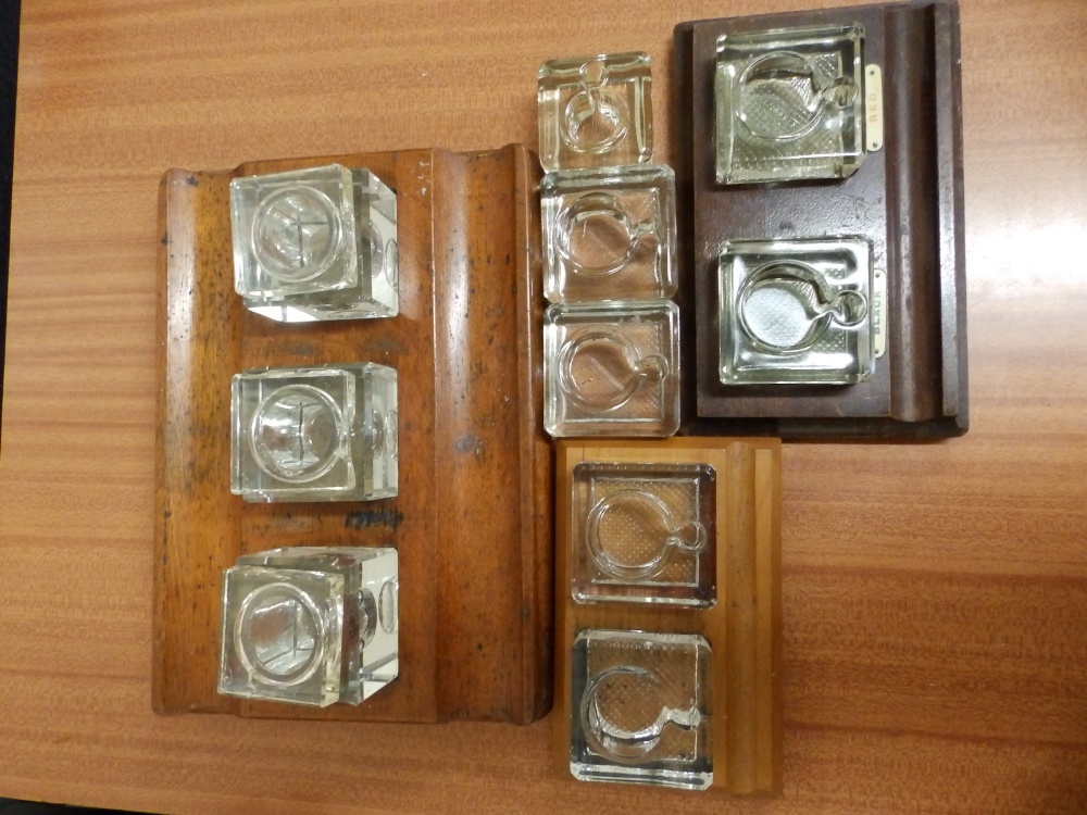 An oak standish with three cut glass inkwells – a/f and various other inkwells.