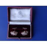 A boxed pair of Asprey 9ct gold nugget cufflinks.