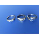 Two old sapphire & diamond set gold band rings and a 9ct ring. (3)