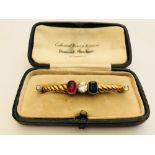 A Victorian ruby, diamond & sapphire set gold bar brooch, featuring a GCS certified natural unheated