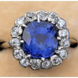 A late 19thC certified natural Sri-Lankan sapphire & diamond cluster ring in yellow gold with silver