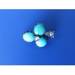 A small turquoise & diamond set clover leaf brooch – 0.75” .